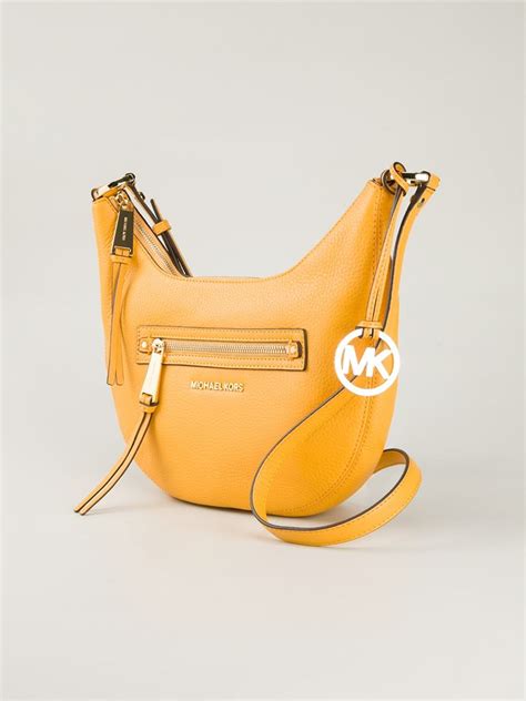 michael kors half moon shoulder bag|Michael Kors shoulder bag.